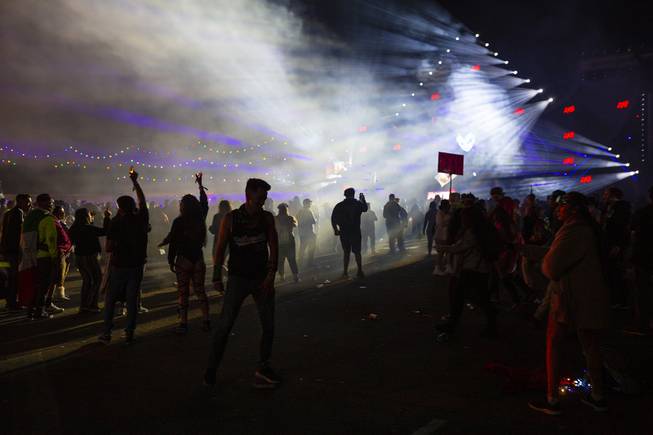 Festival-goers watch a performance by Warface during night three of the Electric Daisy Carnival at the Las Vegas Motor Speedway Monday, May 20, 2019.