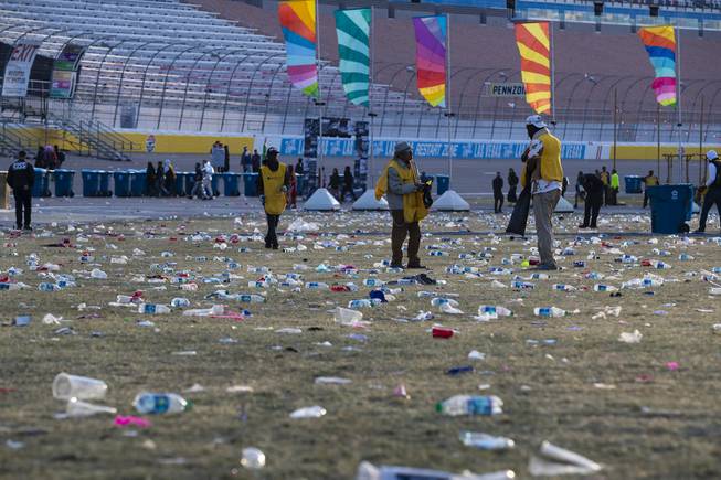 Staff pick up festival-goers trash at the closing of the Electric Daisy Carnival at the Las Vegas Motor Speedway Monday, May 20, 2019.