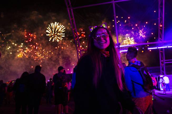 Festival-goers watch a fireworks display during night three of the Electric Daisy Carnival at the Las Vegas Motor Speedway Monday, May 20, 2019.
