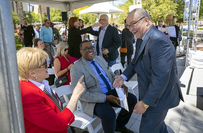 Las Vegas Mayor Carolyn Goodman, left, and Las V Vegas City Councilman Cedric Crear, center, chat with Myron Martin, president and CEO of the Smith Center for the Performing Arts, during a groundbreaking ceremony for Auric, a luxury, mid-rise apartment complex by Southern Land Company (SLC), at Symphony Park in downtown Las Vegas, May 21, 2019. The complex will be built on six acres of vacant land north of the Smith Center.