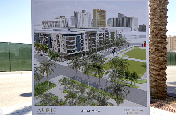 An artist's illustration showing an aerial view of Auric is displayed during a groundbreaking ceremony for the luxury, mid-rise apartment complex by Southern Land Company (SLC), at Symphony Park in downtown Las Vegas, May 21, 2019. The complex will be built on six acres of vacant land north of the Smith Center for the Performing Arts.