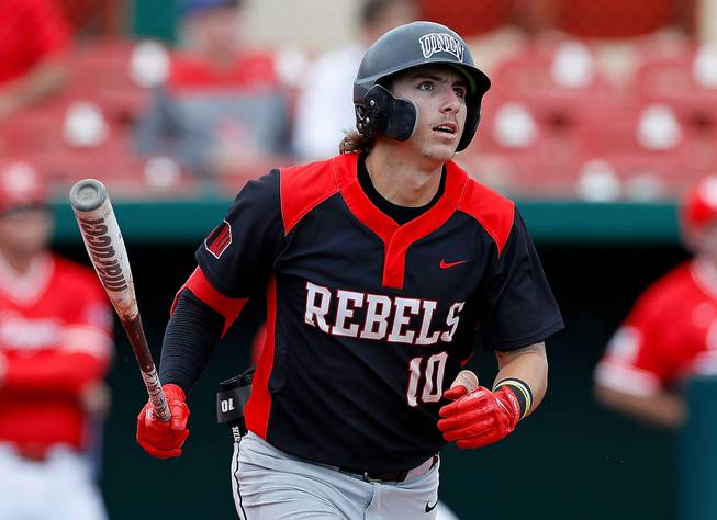 In this Sunday, May 5, 2019, file photo, UNLV's Bryson Stott (10) watches the ball during an NCAA college baseball game against the University of Houston, in Houston.