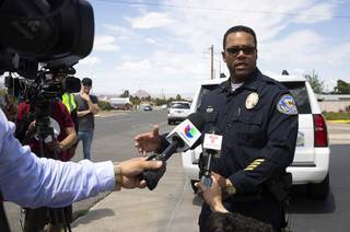 Henderson Police Lt. Kirk Moore briefs reporters on a fatal shooting in a residential area near Major Avenue and Van Wagenen Street in Henderson Friday, May 31, 2019.