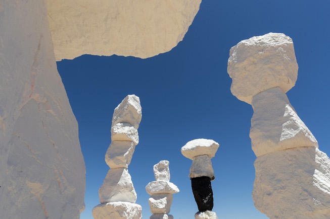 The Seven Magic Mountains are covered with a white primer ...