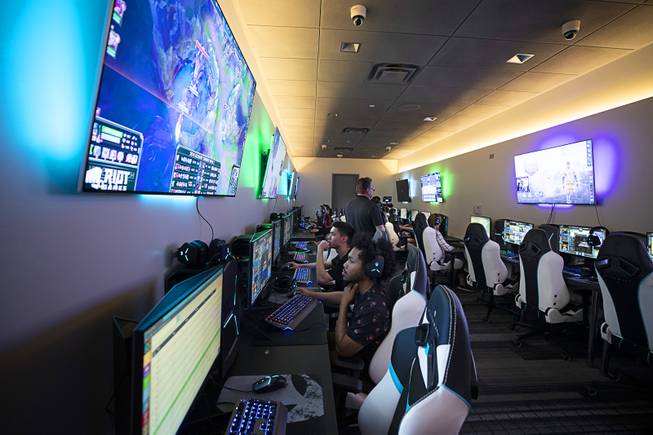 Gamers try out the eSports Lounge powered by Alienware during ...