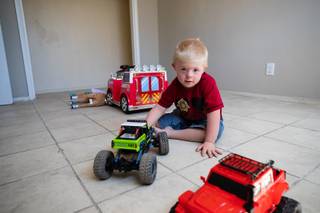 Xavier Nolen, 4, plays with a toy truck inside his new home on Monday, June 3, 2019.