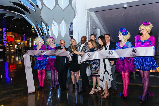 A ribbon is cut for The Hunger Games: The Exhibition ...