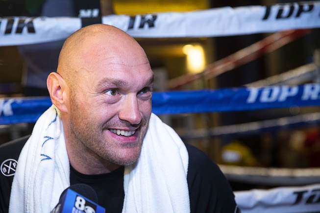 Heavyweight boxer Tyson Fury of England takes questions from reporters ...