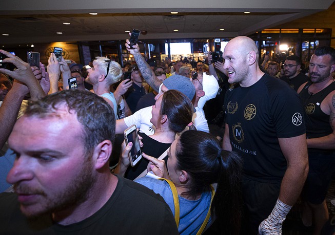 Heavyweight boxer Tyson Fury of England pose with fans following ...