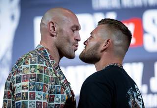 Heavyweight boxers Tyson Fury, left, of England and Tom Schwarz of Germany face off during a final news conference at the MGM Grand Wednesday, June 12, 2019. The boxers will headline a card at the MGM Grand Garden Arena Saturday, June 15.