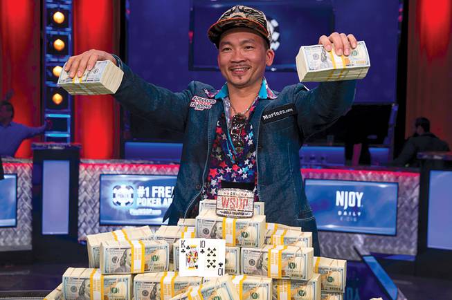Qui Nguyen of Las Vegas celebrates his 2016 World Series of Poker Main Event win.