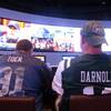 In this Sept. 9, 2018, photo, customers watch sports on a giant screen at the sports book of the Ocean Resort Casino in Atlantic City, N.J.