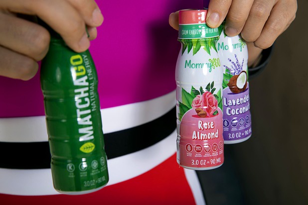 Elena Ledoux, CEO of Superb Maids and "chief mommy" for MommyGO energy shots, poses with energy shots outside her company's offices on South Jones Boulevard Wednesday, June 19, 2019.