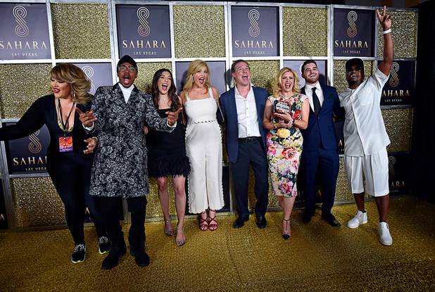 SLS Las Vegas owner Alex Meruelo, fifth left, with family ...