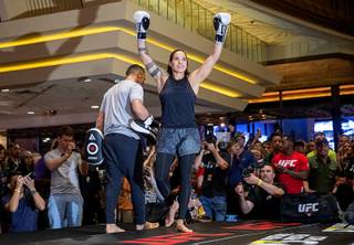UFC women's bantamweight and featherweight champion Amanda Nunes finishes an open workout for UFC 239 at the MGM Grand Wednesday, July 3, 2019. Nunes will defend her bantamweight title against Holly Holm in UFC 239 at T-Mobile Arena on Saturday.