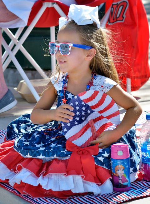 Elizabeth Donofrio watches the Fourth of July parade during the ...