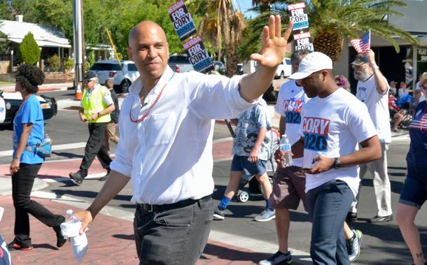 Democratic presidential candidate U.S. Sen. Cory Booker walks in the Fourth of July parade during the 71st Annual Boulder City Damboree Celebration in Boulder City on Thursday, July 4, 2019.