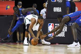 Milwaukee Bucks guard Sterling Brown grabs a loose ball from the Philadelphia 76ers during their NBA Summer League game Friday, July 5, 2019, at the Thomas & Mack Center in Las Vegas.