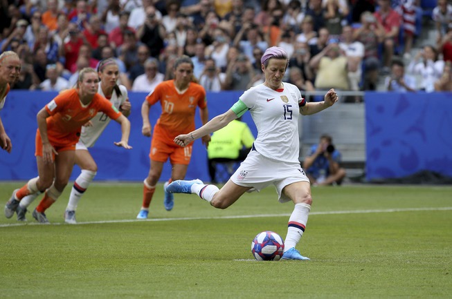United States' Megan Rapinoe scores her side's opening goal from ...