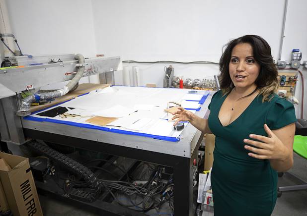 Marylou Soto, co-owner of Lazer Ladies, a veteran-owned small business, shows off laser engraving machines, before a visit by Sen. Jacky Rosen, D-Nev., in North Las Vegas Friday, July 12, 2019. Rosen unveiled her Veterans Jobs Opportunity Act which will provide tax credit for veterans who start a small business in underserved communities.
