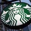 This June 26, 2019, file photo shows a Starbucks sign outside a coffee shop in downtown Pittsburgh.