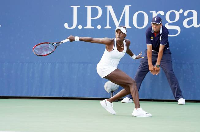 Asia Muhammad returns a shot Aug. 27, 2018, during a tennis match at the U.S. Open against Maria Sakkari at USTA Billie Jean King National Tennis Center.