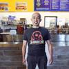 A cardboard cutout of founder Ike Shehadeh is displayed at  Ike's Love & Sandwiches in the Fashion Show Mall food court Friday, July 19, 2019. The Las Vegas High Roller menu includes a $100.00 "Howard Hughes" sandwich.