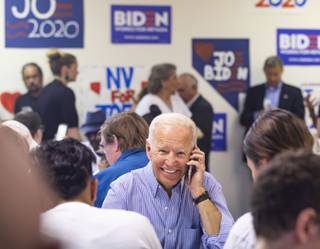 Democratic presidential candidate and former Vice President Joe Biden speaks on the phone during a campaign event at the International Brotherhood of Electrical Workers Local 396 in Las Vegas on Saturday, July 20, 2019.