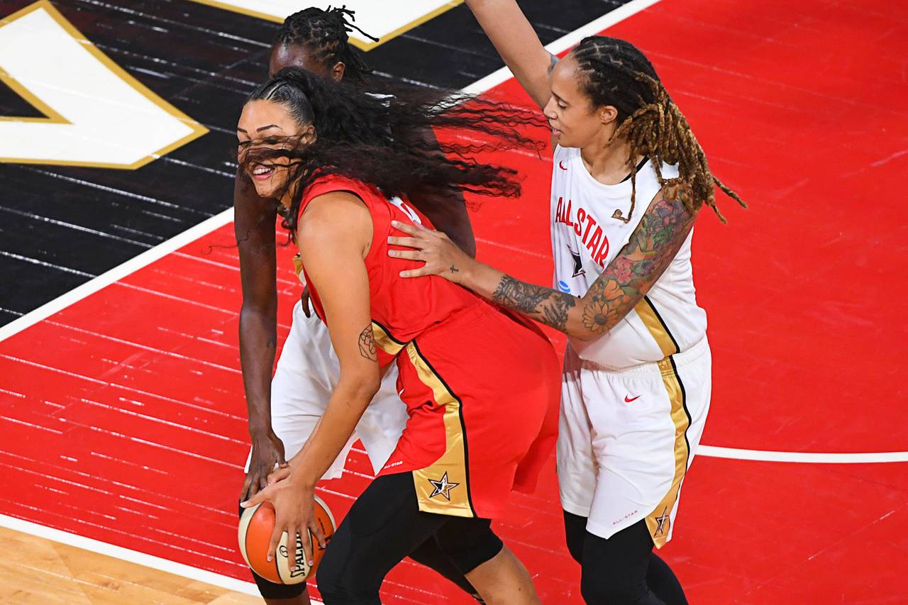 Phoenix Mercury's Brittney Griner, of Team Delle Donne, dunks over Las  Vegas Aces' Liz Cambage, of Team Wilson, during the first half of a WNBA  All-Star game Saturday, July 27, 2019, in