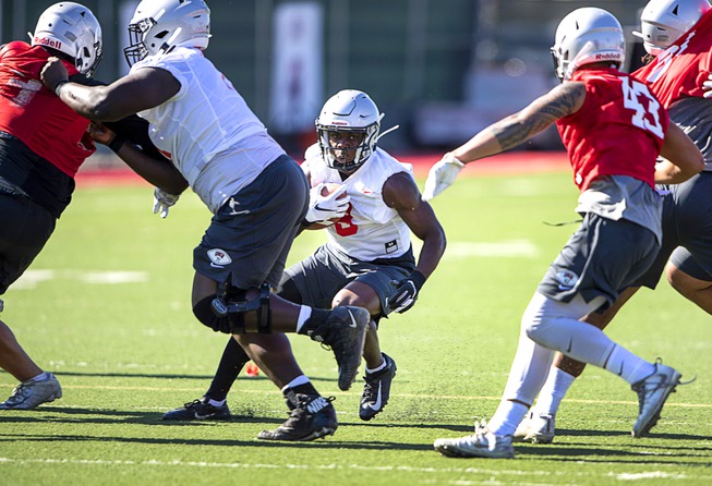 UNLV running back Charles Williams finds a hole during practice ...