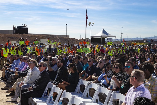 Attendees gather for a topping off ceremony at the Raiders' ...