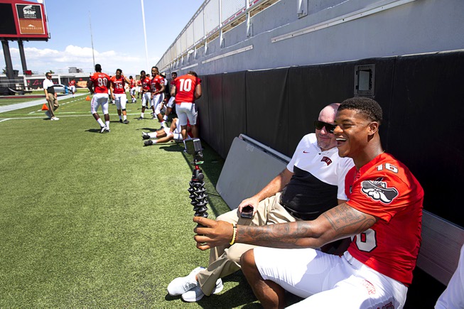 UNLV Rebels linebacker Javin White (16) takes a video with ...