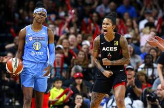 Las Vegas Aces forward Tamera Young, right, celebrates a play against Chicago Sky guard Diamond DeShields, left, during a WNBA game at the Mandalay Bay Events Center Friday, Aug. 9, 2019.