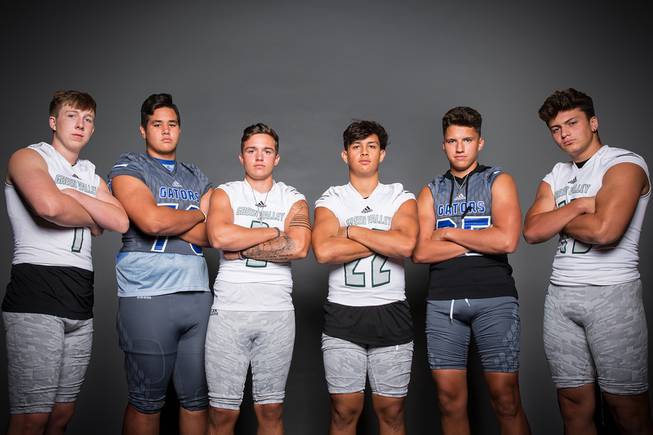 Members of the Green Valley High School football team are ...