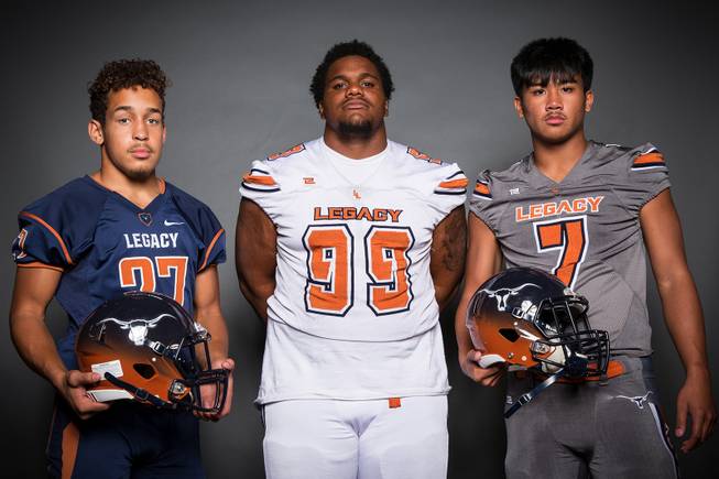 Members of the Legacy High School football team are pictured during the Las Vegas Sun's high school football media day at the Red Rock Resort on July 24, 2019. They include, from left, Andres Nunez, Lee Wilson and Evan Olaes.