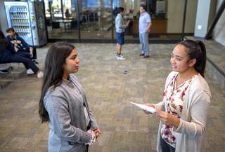 Brianna Venegas, left, an incoming freshman at Cristo Rey St. Viator Las Vegas College Preparatory, works on her networking skills with Destrie Ranon, a school employee, at the College of Southern Nevada in North Las Vegas Friday, Aug. 16, 2019.