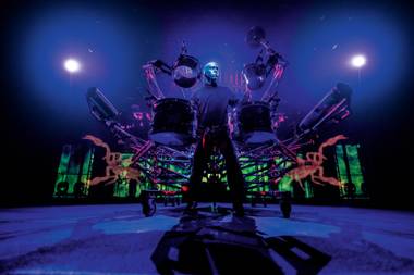 The opening scene of the Blue Man Group’s show at Luxor has the famous trio of silent characters producing sounds and making music by rotating tubes and banging on plastic pipes ...