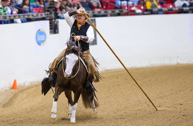 Bub Poplin of Fruita, Colo. and his horse Smokin Custom Chrome perform during the $50,000 Added Invitational Freestyle competition at the South Point Arena Saturday, Aug. 17, 2019. The event was part of "The Run For a Million," the world's richest reining championship event, which was filmed for Paramount Network's "The Last Cowboy."