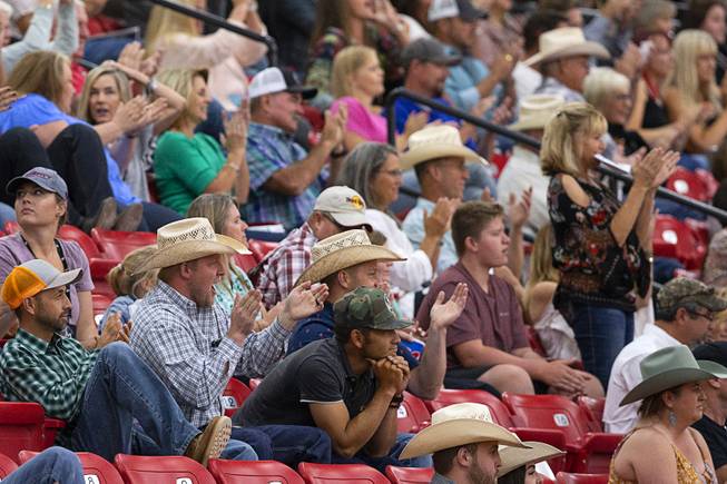 Audience members cheer a performance during the $50,000 Added Invitational Freestyle competition at the South Point Arena Saturday, Aug. 17, 2019. The event was part of "The Run For a Million," the world's richest reining championship event, which was filmed for Paramount Network's "The Last Cowboy."