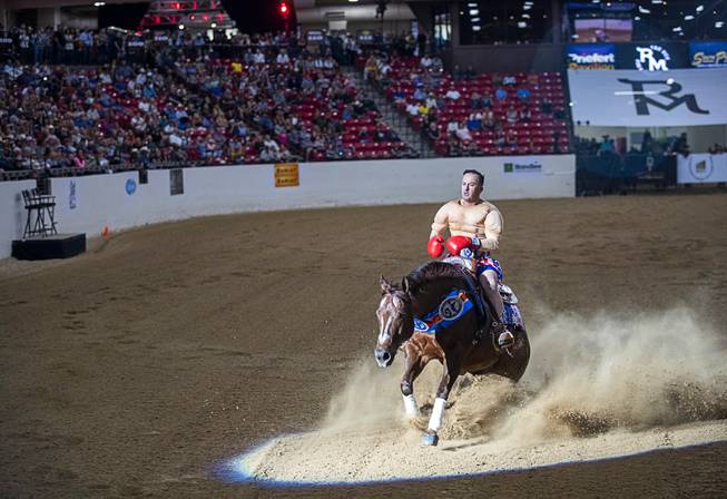 Andrea Fappani of Scottsdale, Ariz. and his horse Custom Spook perform a sliding stop during the $50,000 Added Invitational Freestyle competition at the South Point Arena Saturday, Aug. 17, 2019. The event was part of "The Run For a Million," the world's richest reining championship event, which was filmed for Paramount Network's "The Last Cowboy."