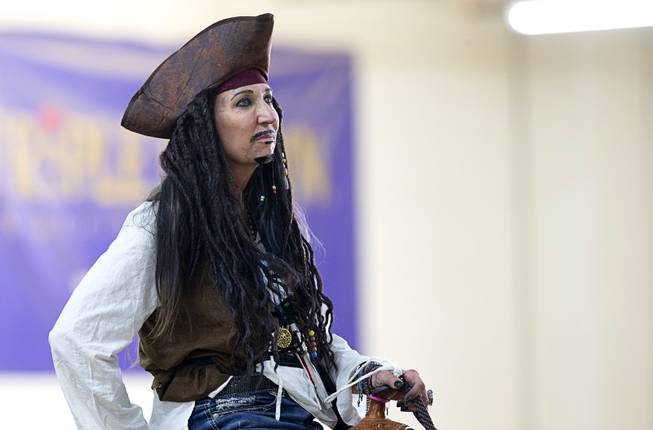 Debi Murnan, dressed as Capt. Jack Sparrow of the Pirates of the Caribbean films, waits to compete in the $50,000 Added Invitational Freestyle competition at the South Point Arena Saturday, Aug. 17, 2019. The event was part of "The Run For a Million," the world's richest reining championship event, which was filmed for Paramount Network's "The Last Cowboy."