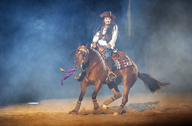 Debi Murnan and her horse Jacs Red Pine spin during the $50,000 Added Invitational Freestyle competition at the South Point Arena Saturday, Aug. 17, 2019. The event was part of "The Run For a Million," the world's richest reining championship event, which was filmed for Paramount Network's "The Last Cowboy."