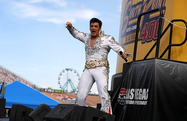 Matt Lewis, of Legends in Concert, performs as Elvis Presley  during pre-race entertainment during the South Point 400 Monster Energy NASCAR Cup Series race at the Las Vegas Motor Speedway Sunday, Sept. 15, 2019.