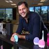 Beki Hoxha, general manager for FOREO North America, poses with Issa sonic electric toothbrushes and Luna facial cleansing devices at the company in Las Vegas Thursday, Sept. 19, 2019. 