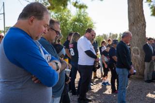 Invited guests gather at Craig Ranch Regional Park during an unveiling of a new bench, a tribute to victims of the Route 91 shooting on the 2-year anniversary, Tuesday Oct. 1, 2019.