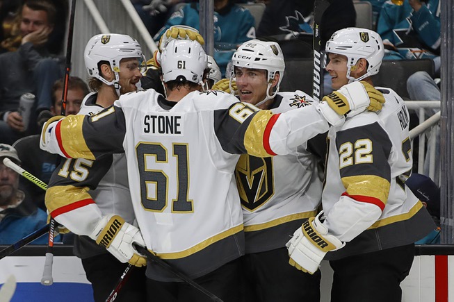 Vegas Golden Knights' Tomas Nosek, second from right, celebrates with ...