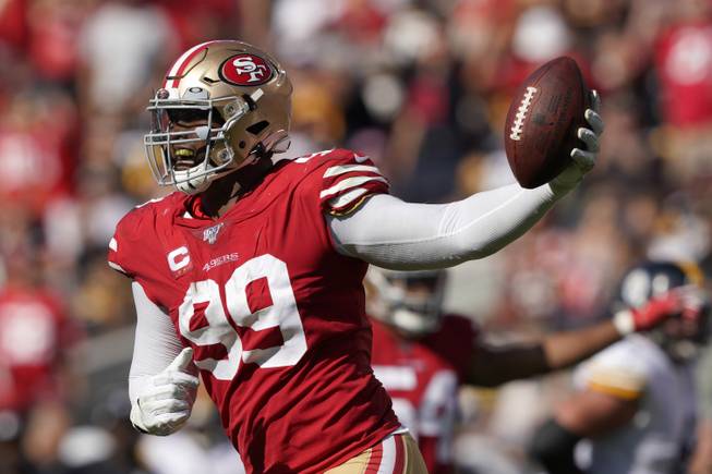 San Francisco 49ers defensive tackle DeForest Buckner (99) celebrates after recovering a fumble against the Pittsburgh Steelers during the second half of an NFL football game in Santa Clara, Calif., Sunday, Sept. 22, 2019. 