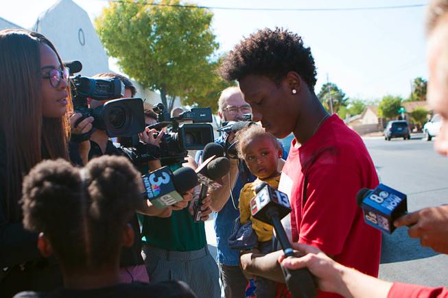 A grandson of Jacqueline Dillon speaks to reporters Oct. 14, 2019, near where she was killed by a hit-and-run driver near Charleston and Nellis boulevards April 3. 
