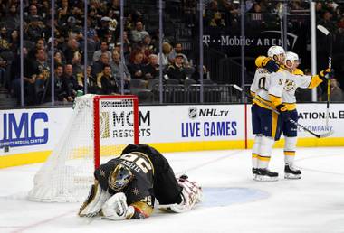 Nashville Predators left wing Filip Forsberg (9) celebrates with teammates after scoring past Vegas Golden Knights goaltender Marc-Andre Fleury (29) during the second period of a game at T-Mobile Arena Tuesday, Oct. 15, 2019.