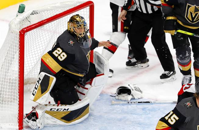 Golden Knights' goaltender Marc-Andre Fleury (29) defends, temporarily without a glove and his stick, during the second period of a game against Ottawa Senators at T-Mobile Arena Friday, Oct. 17, 2019.